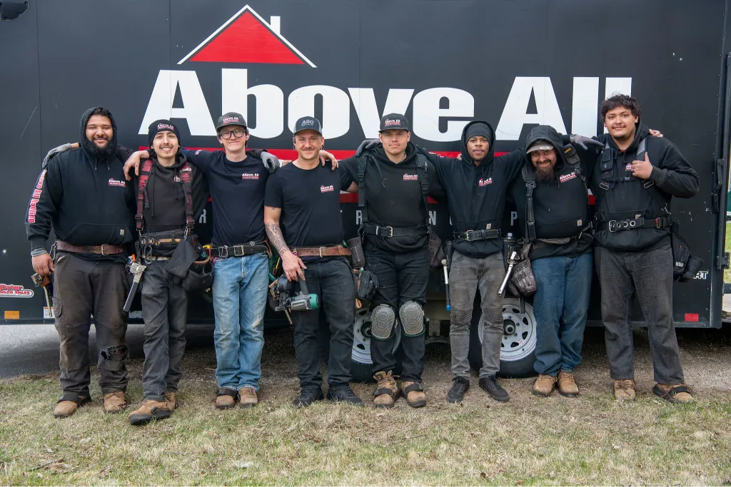 Roofing team collaborating to deliver high-quality work on a residential project in Rochester, Minnesota