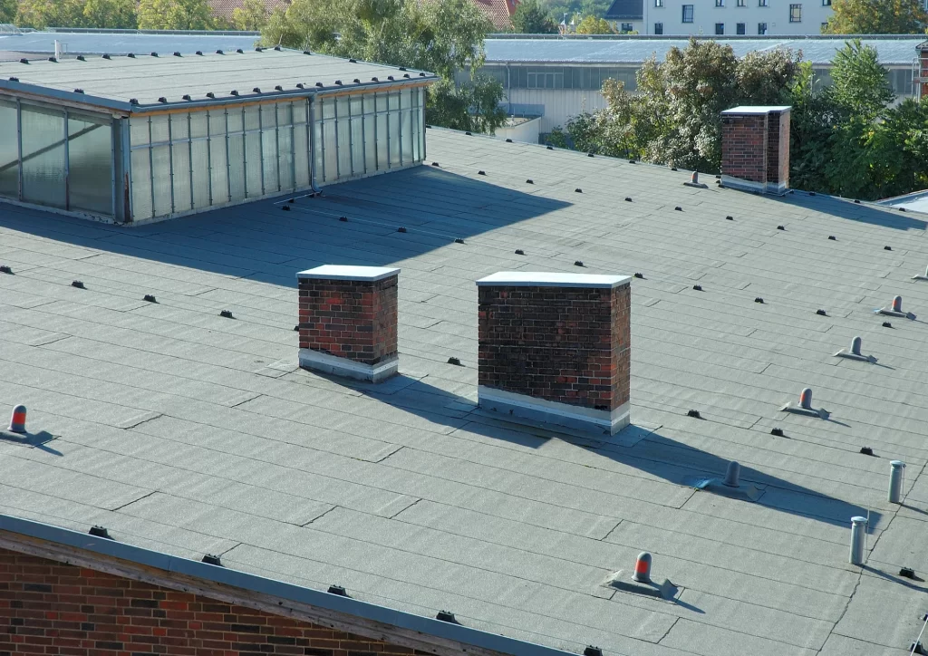 Flat roof commercial property designed for Minnesota weather, professional roofing solutions by Above All Roofing